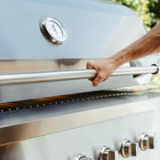 Full‑width, heavy‑duty handle makes opening and closing the hood smooth and secure with one hand.