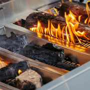 AMG's hybrid fuel trays let you load real wood and lump charcoal over gas burners, so you get authentic live‑fire flavor with the convenience of push‑button ignition.