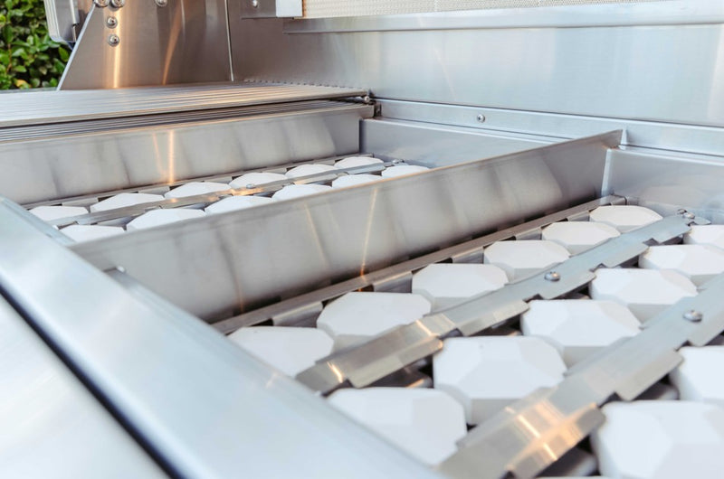 Ceramic briquettes spread heat evenly across the grates, reducing hot spots and flare‑ups for more predictable results.