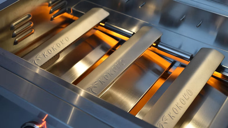 Stainless steel burners and heat tents on Kokomo Elite gas grills deliver even, consistent heat so you can cook edge‑to‑edge without hot spots.