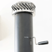 Adjustable chimney vent helps manage airflow and heat retention for better control over baking, roasting, and live-fire flavor.