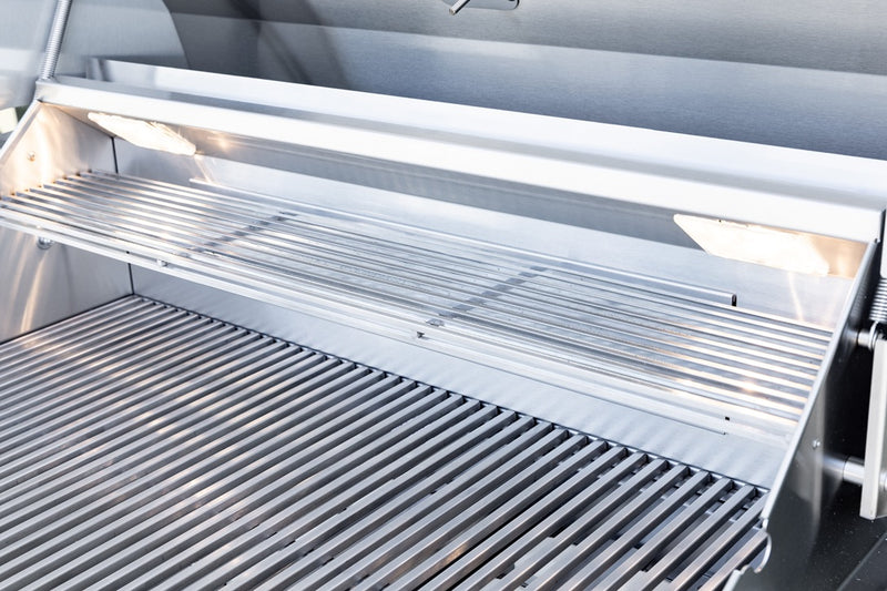 Full-width stainless warming rack keeps sides and buns hot while you finish steaks and burgers on the main grate.