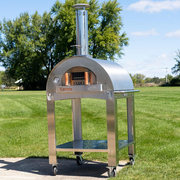 Professional 32" wood-fired oven on sturdy rolling cart for high-capacity backyard pizza service anywhere.