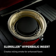 SloRoller insert installed in grill shows how the hyperbolic chamber circulates smoke for more even flavor