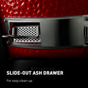 Slide-out ash drawer closed shows the clean design that keeps ash contained between cooks